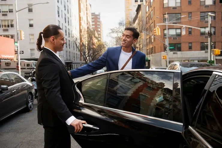 chauffeur driven car drop off at hotel entrance
