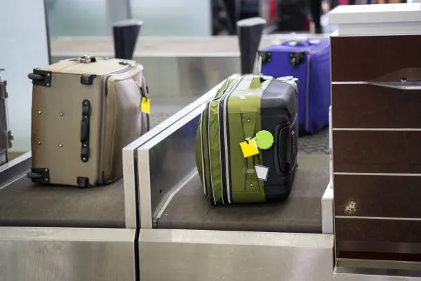 Airport check-in baggage weighing process