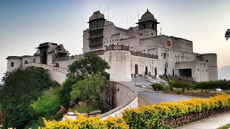 Sunset view from Sajjangarh Monsoon Palace overlooking Udaipur lakes and Aravalli hills