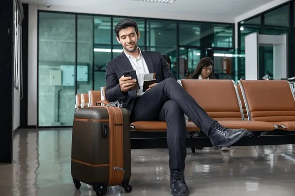 Corporate Travel Management Company in Delhi assisting business traveller at airport for executive flight travel